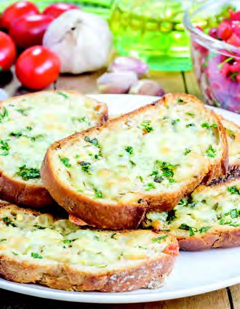 GARLIC TOAST WITH CHEESE French bread or ltalian bread cut into slices.