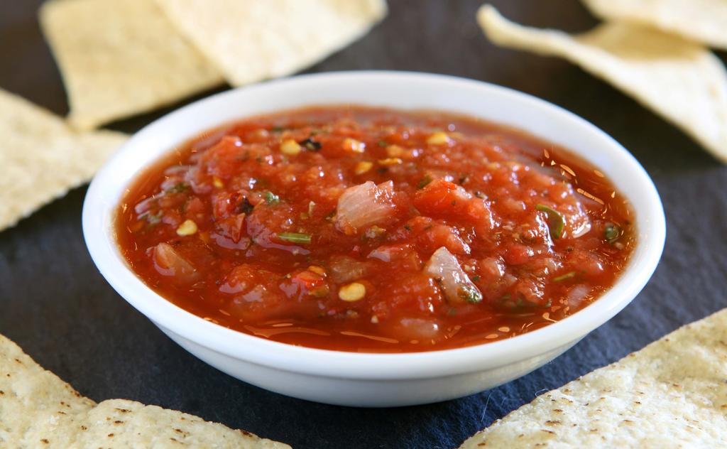 Restaurant Style Salsa Yield: 4 c Total Prep Time: 5m 1 28 oz can tomatoes, including juice 2 yellow onions, peeled and roughly chopped 1 jalepeno peppers, de-stemmed 3 cloves garlic,