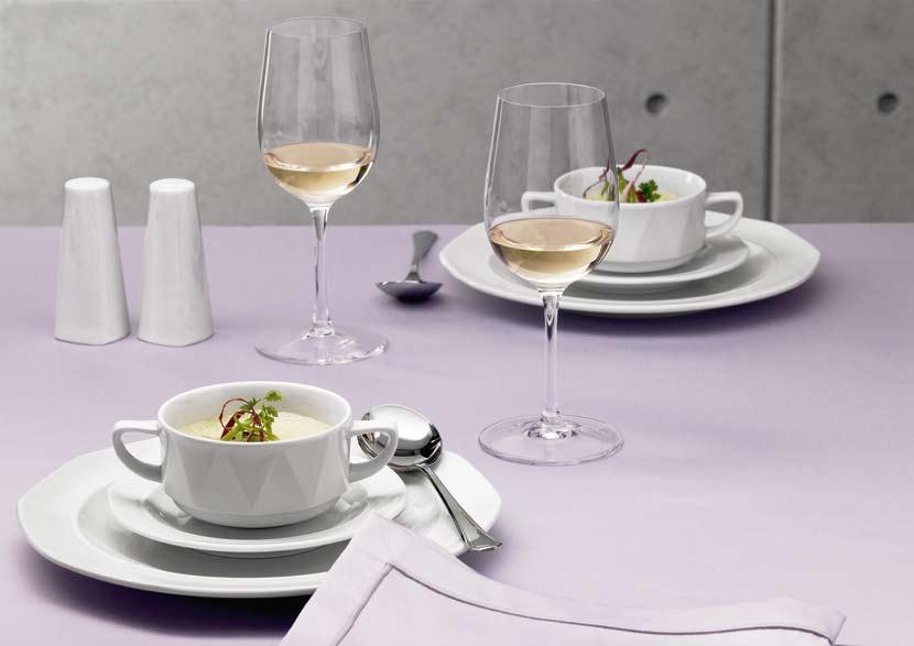 Self-assured style A table set with Prisma is never bland. The distinctive hollowware is employed with round or octagonal plates and can be augmented with matching table accessories.