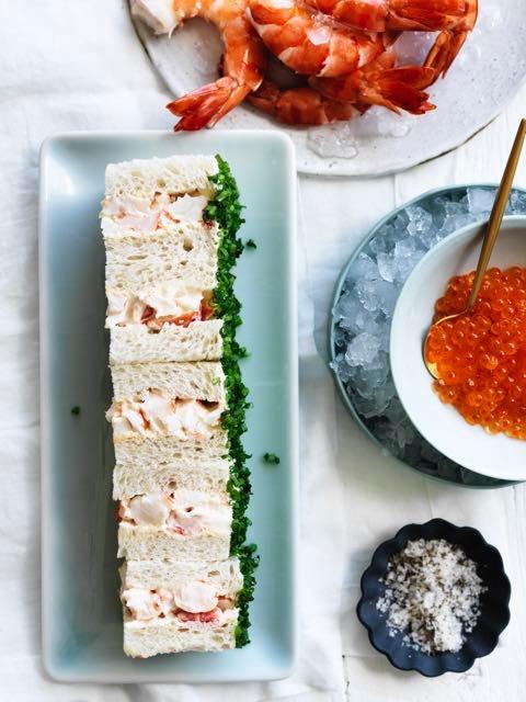 Prawn finger sandwiches with chives and chilled salmon caviar This is a perfect Valentines Day Dish.