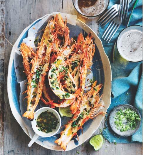 Grilled Australian Prawns with Tarragon and Garlic Butter 100g butter, softened 2 cloves garlic, crushed 2 tablespoons chopped tarragon leaves ½ teaspoon chilli flakes 24 extra large green Australian