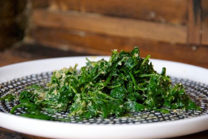 Dandelion Greens with Ghee [Serves 4] 2 bunches dandelion greens, cut into strips ¼ cup ghee, melted ½ cup nutritional yeast salt and pepper Cook dandelion greens in salted boiling water for 15