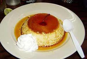 Classic Mexican Flan 1/2 c. granulated sugar 1 (14 oz.) can sweetened condensed milk 1 c. milk 3 lg. eggs Yolks of 3 lg. eggs 1/2 tsp. almond extract 1 tsp. vanilla extract 1.