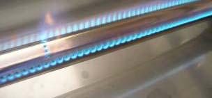 Burner flames should be blue and stable with no yellow tips, excessive noise, or