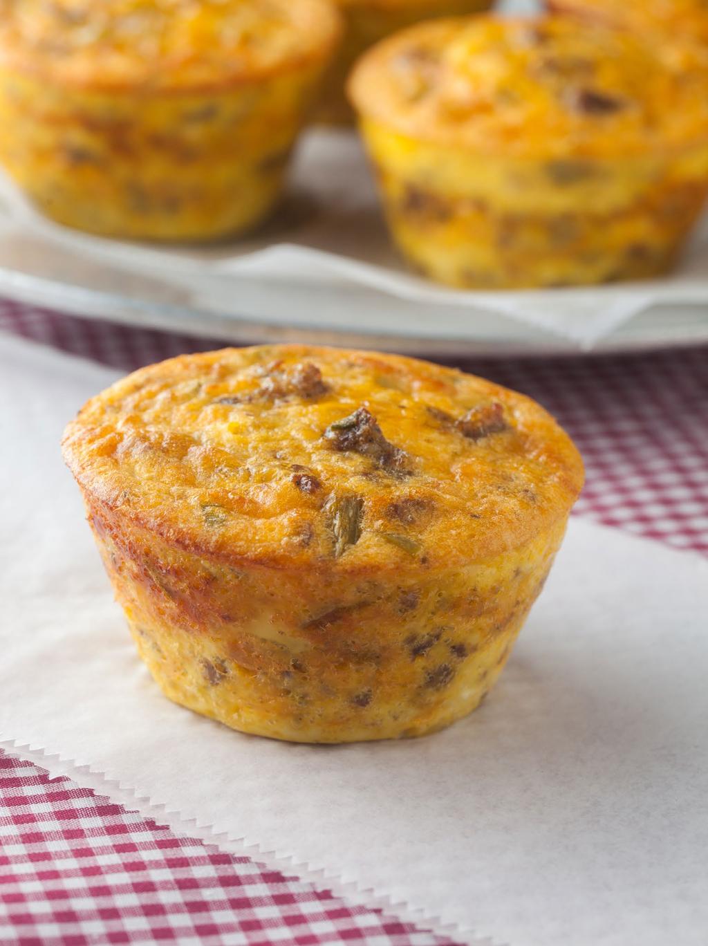 Individual Chipotle Tabasco Cheddar Sausage Frittatas Serves 6 Texas- sized muffin pan sprayed with cooking spray 1 pound bulk breakfast sausage, cooked crumbled and drained on paper towels 2/3 cup