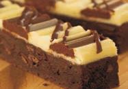 Original Cakerie Triple Chocolate Chunk Brownies 2/12x16 #388587 - SK AB Chewy dark fudge brownie packed with creamy