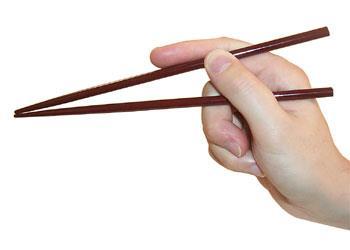 10. Where should the side of the second chopstick rest? A. at the lower joint of the middle finger B.