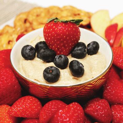 SNACKS, SMOOTHIES & JUICES CINNAMON & HONEY FRUIT DIP WITH STRAWBERRIES AND APPLES YIELDS: 4 SERVINGS 1 cup Plain Yogurt 1 tablespoon Almond Butter 1 tablespoon Honey 1 teaspoon Cinnamon 2 cups