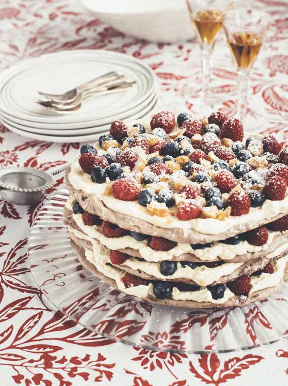 Chocolate macadamia Pavlova stack SERVES 8-10 4 x 700g egg whites 1 1/3 cup raw caster sugar 2 teaspoons vanilla extract ¼ cup macadamias, roasted, roughly chopped ¼ cup macadamia meal ¼ cup cocoa