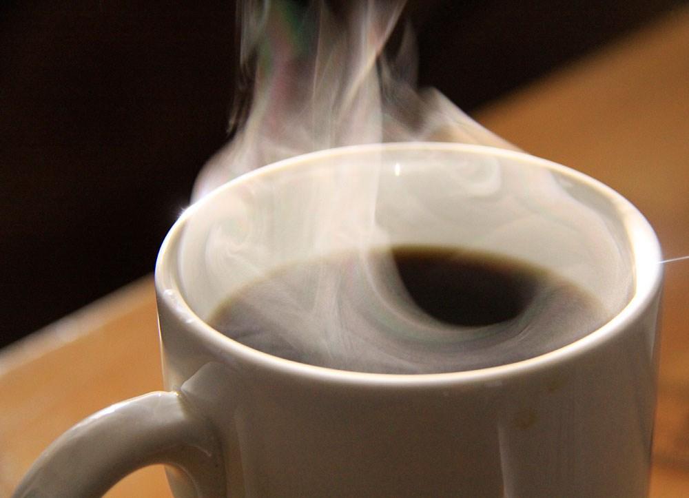 PHARMACY NEWS Benefits of Your Morning Brew Whether we drink it with a gallon of creamer or the more traditional black, Americans drink about three cups of coffee every day, and According to a survey