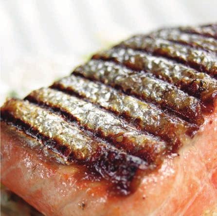 Sprinkle salt on the salmon fillets and brush them with oil.