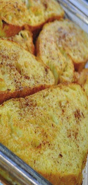 Baked French Toast 5 eggs 1/8 cup sugar (optional) 1 ½ cups nonfat milk ½ teaspoon vanilla 8 slices of bread (can be torn into pieces) Serves 4 1. Lightly grease a 13x9x2 inch baking pan.