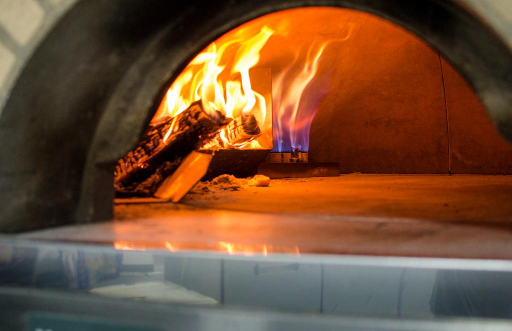All Fired Up Wood Fired A wood fired oven provides a unique charm and appealing ambiance to your restaurant.