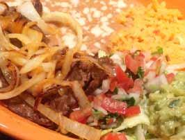 Sizzling Fajitas Your choice of meat or shrimp grilled with sautéed red and green peppers, white onions, green onions and tomatoes tossed in our special sauce and served sizzling.