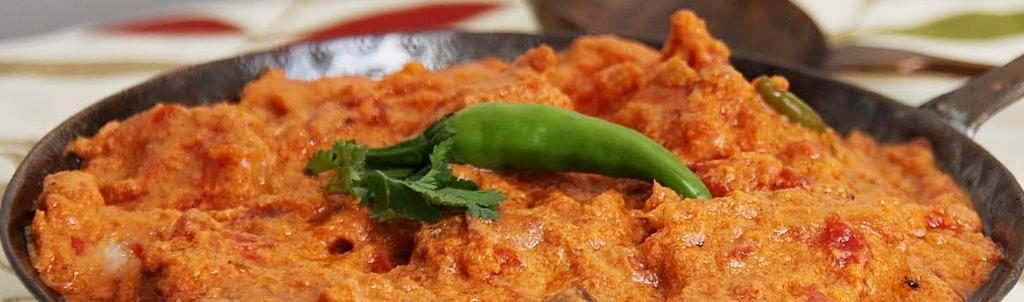 Butter-Chicken/Lamb/Beaf Specialty of Northern india, cooked with butter, cream, spices & fresh tomatoes (mild) 26.