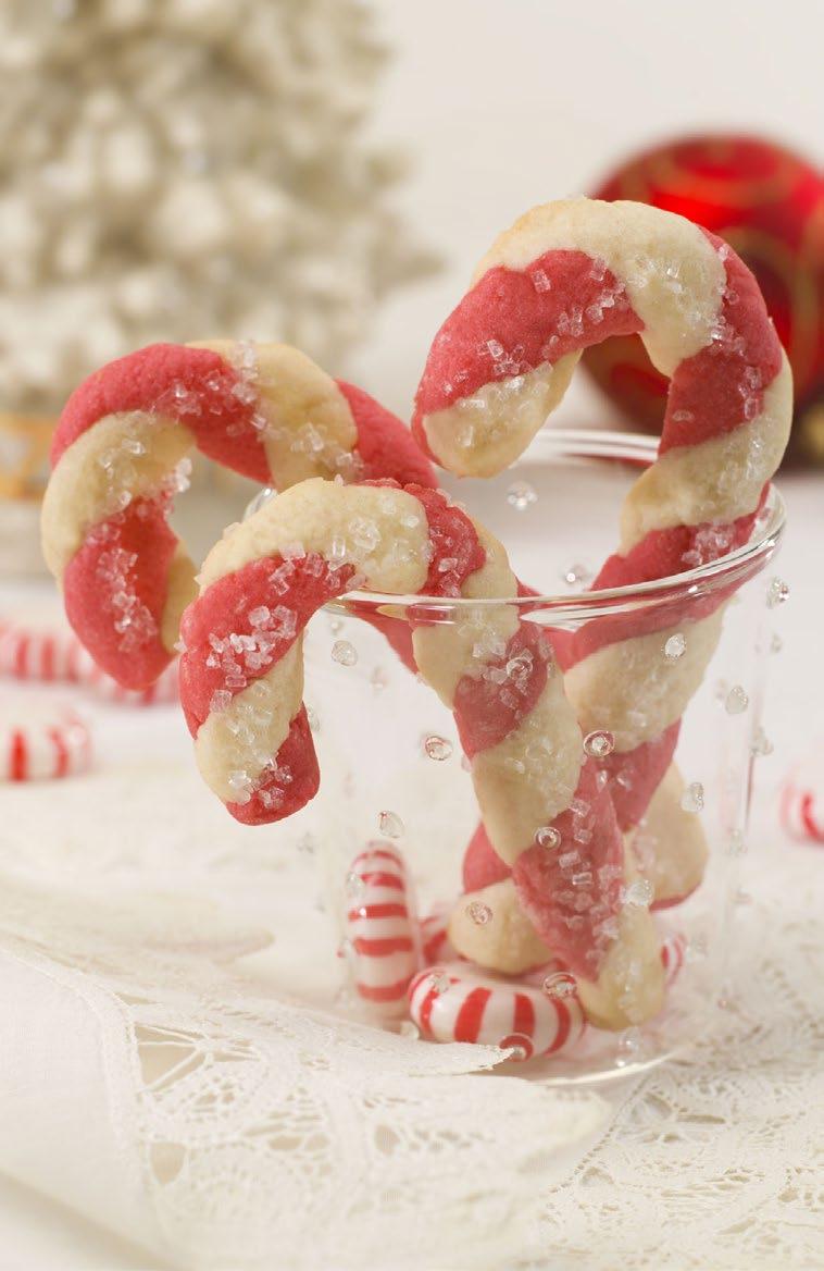 Peppermint Cookie Canes These sugar cookies look and taste like candy canes. Two colors of sugar cookie dough are wrapped into a cane shape.