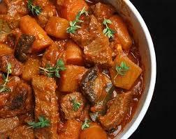 Barbecue Beef Stew 1-2 lbs. stew meat 1 cup onion, sliced 1/2 cup green pepper, chopped 1 clove garlic 1/2 tsp. salt 1/8 teaspoon pepper 2 cups beef stock 1 can (8 oz.) tomatoes 1 can (4 oz.