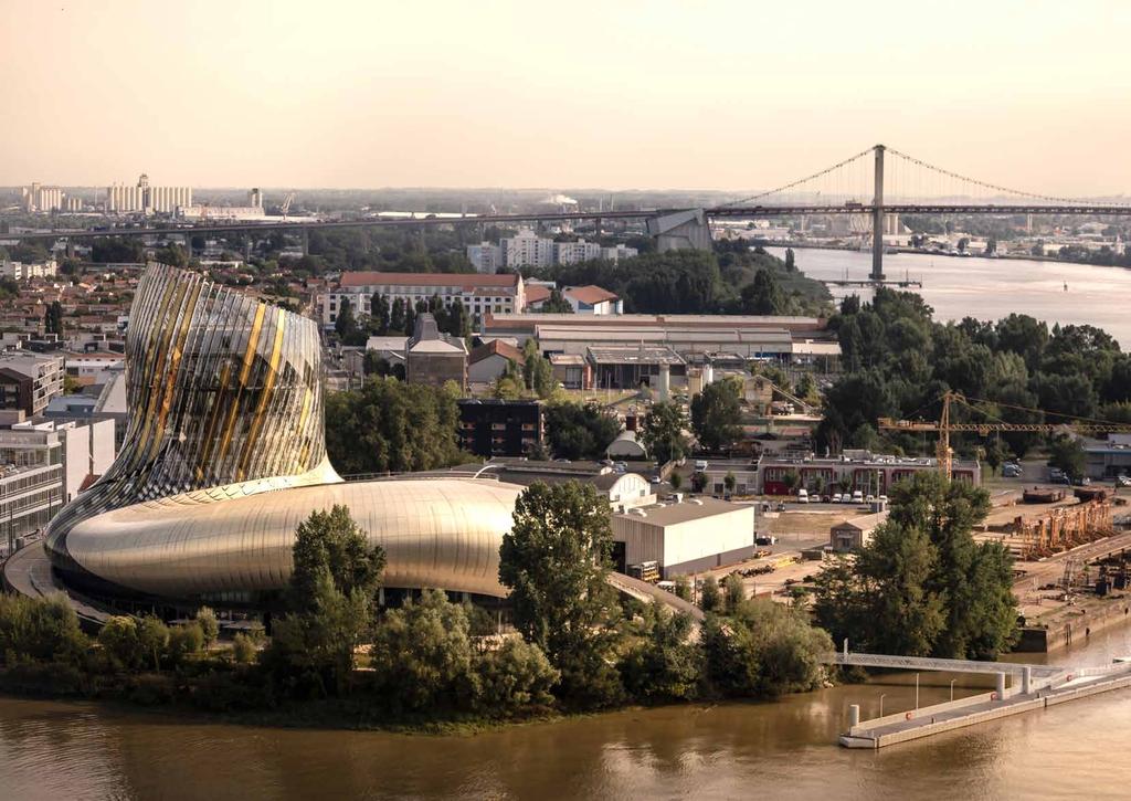 LA CITÉ DU VIN A majestic glass tower stands on the banks of the Garonne river.