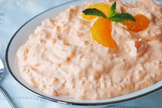 Orange Fluff 24oz Cottage Cheese 16oz Cool Whip 6oz Orange Jell-o 15oz Canned Mandarin Oranges 16oz Cream Cheese Put cottage cheese in mixing bowl. Add jell-o and softened cream cheese.