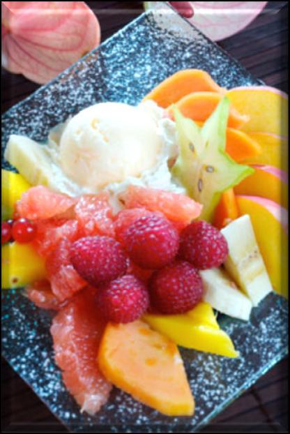 Fruit salad of orange, strawberry, apple