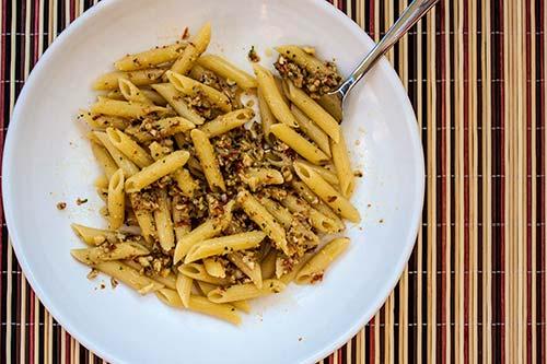 SPICY ALMOND PESTO Pesto sauce is a traditional recipe, but we love to play with variations of the sauce, introducing spicy chili peppers and trying different nuts.