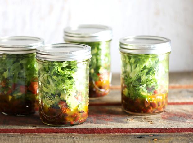 Mexican Mason Jar Salads The secret to keeping this on-the-go salad fresh is to keep the dressing at the bottom and the greens at the top.