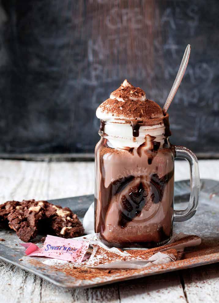 DELICIOUS hot chocolate WITH CACAO & CHILI TOPPING ½ pt hot milk 2 tbsp of hot chocolate powder A tbsp of whipped cream A good pinch of Santa Maria Cacao & Chili Make hot chocolate, spoon on whipped