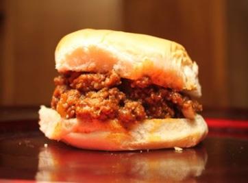 Sloppy Joes 2 pounds ground beef 1 large onion, chopped 2 garlic cloves 1 8 oz can tomato sauce 1 6 oz can tomato paste 1/2 cup ketchup 1/3 cup packed brown sugar 3 T.