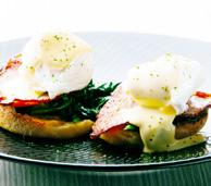 served on toasted English muffin with sautéed spinach,