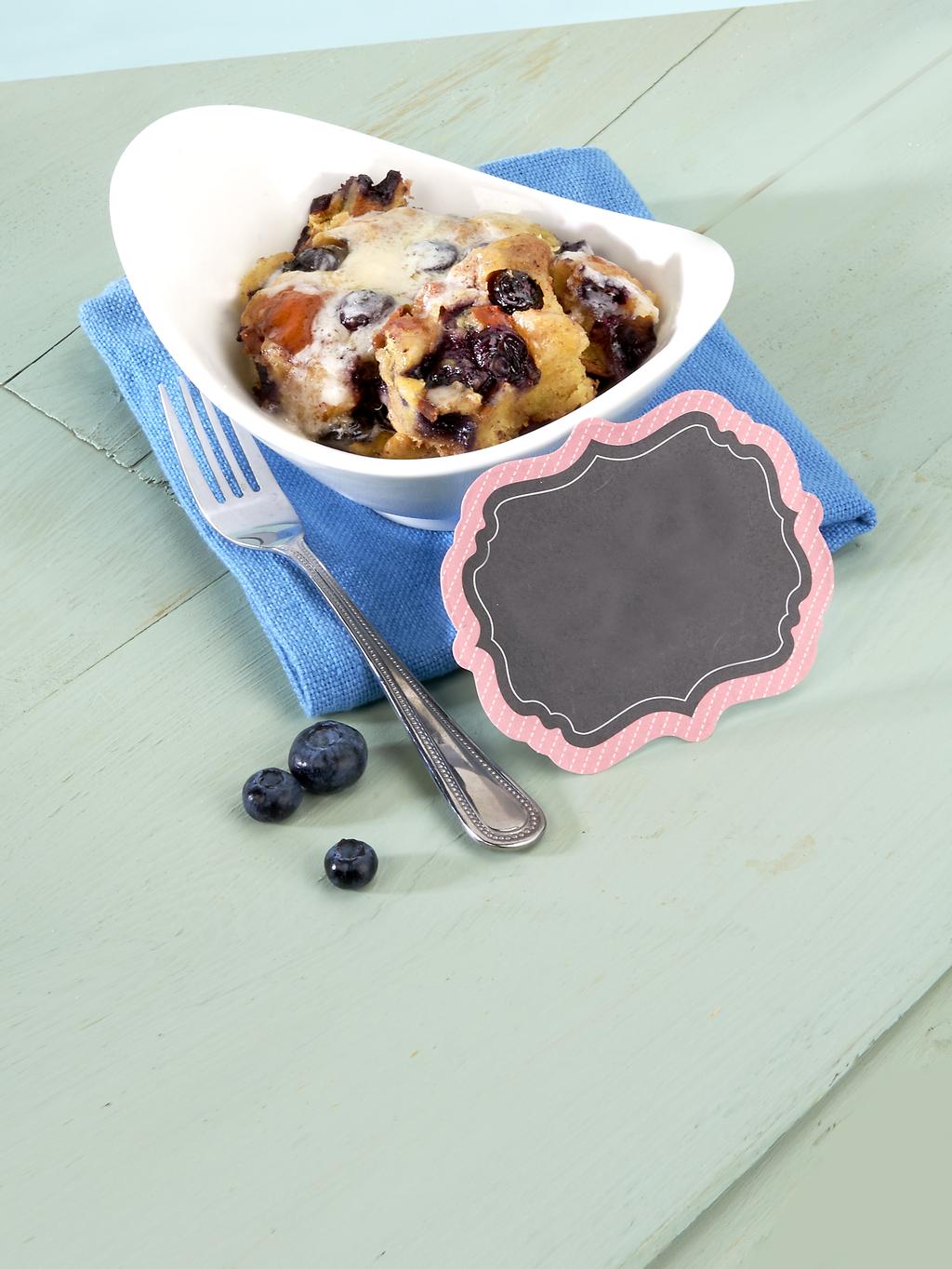 y r r e b e Blu read B ding Pud pudding 3 cups blueberries, washed, drained and dried 2 large eggs, slightly beaten 2 cups whole milk 6 tbsp butter 1/2 cup Domino Granulated Sugar 2 tsp vanilla