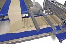 The belt with the dough sheet moves back and forth above the next conveying belt, this is an asymmetric lamination system.