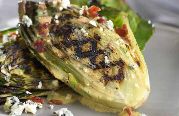 Grilled RomaCrunch with Blue Cheese & Bacon Vinaigrette 3 tablespoons olive oil 2 large shallots, diced ½ pound bacon, chopped ½ cup apple cider vinegar 2 teaspoons sugar 3 heads RomaCrunch lettuce,