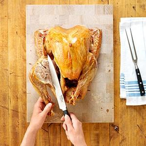 How to Carve a Turkey Step 1 Place bird on a carving board and