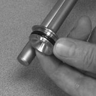 29 Install knob. Place the knob with the knob o-ring onto the threaded end of the plunger.