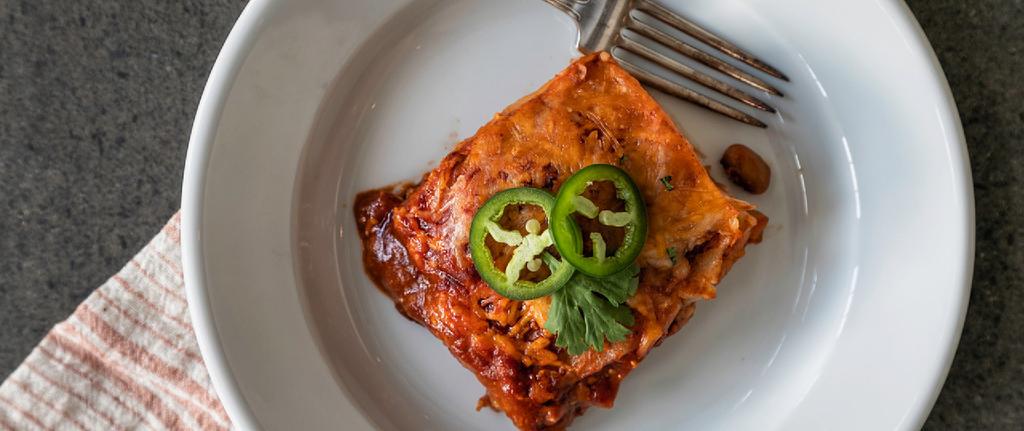 WEDNESDAY EASY ENCHILADA CASSEROLE 1 15-ounce can enchilada sauce 1 15-ounce can tomato sauce 6 soft flour tortillas 2 1/2 cups shredded chicken (either from a rotisserie chicken, a whole chicken
