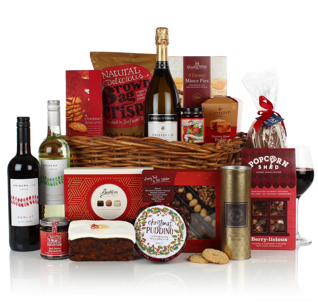 TASTE OF CHRISTMAS BASKET Presented in a rattan storage basket containing: Stelle D Italia Prosecco 11% vol Merlot Primera Luz Central Valley Chile 75cl 12.