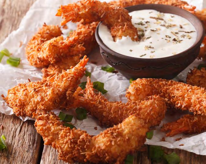 Coconut Crusted Shrimp 1 pound deveined and peeled jumbo shrimp 1/3 cup flour 1/2 tsp salt 1/2 tsp pepper 2 large eggs, beaten, 3/4 cup panko breadcrumbs 1 cup sweetened shredded coconut Vegetable