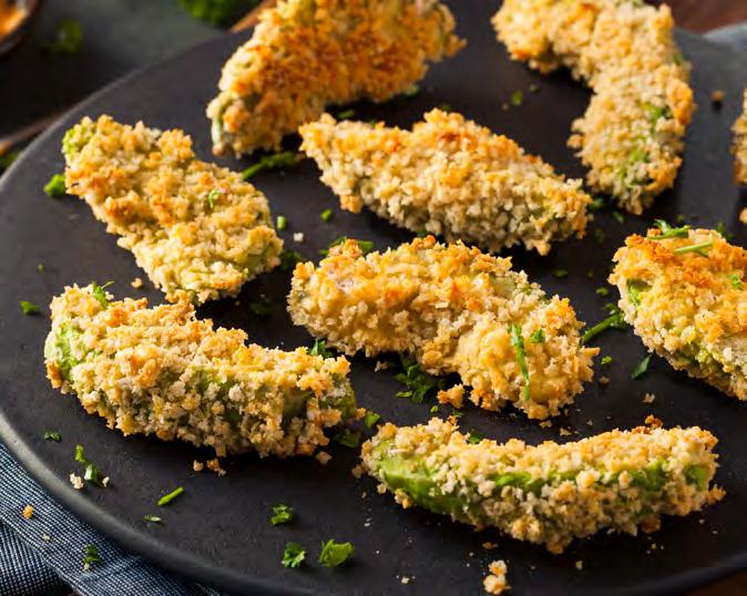 Avocado Fries 22 2 avocados, not fully ripe juice of 1 lime salt & pepper 1 egg ¼ cup flour 1/2 cup panko breadcrumbs Cut avocados in half, lengthwise. Then cut into slices and remove from the skin.