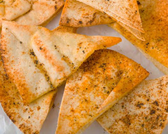 Pita Chips 25 4 pitas 1 tbsp olive oil Salt & pepper ½ tsp garlic powder Pinch of cayenne pepper Cut pitas into 8 triangle slices.