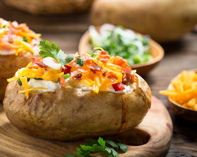 Twice Baked Potato 4 Russet potatoes Olive oil Salt & pepper 2 tbsp butter, softened 1/4 cup sour cream 1/4 cup freshly chopped chives 2 green onions, thinly sliced 3/4 cup shredded cheddar cheese 4
