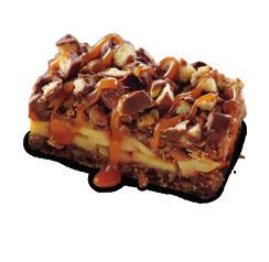 CHOCOLATE BREAD PUDDING MADE WITH SNICKERS Piping hot, delectable chocolate bread pudding with layers of melted SNICKERS, served warm and