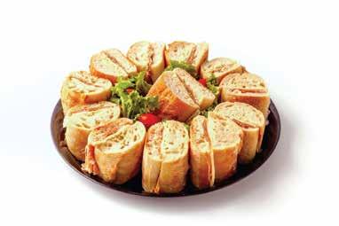 Party Sandwich Tray Soft fresh French Bread filled with our Top Round Roast Beef, Fresh Turkey, Baked & Glazed Ham and Salami. We top if off with Provel and American Cheeses, Lettuce and Tomato.