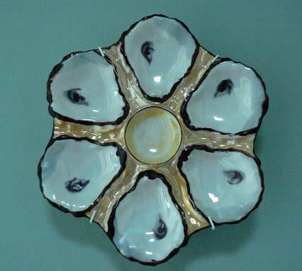 each No. 65 Porcelain six well oyster plate.