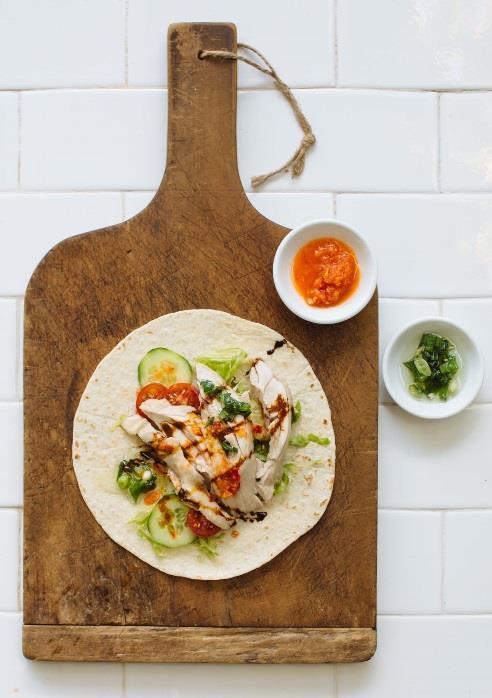 Hainanese chicken wrap The classic Hainanese chicken makes a perfect wrap filling. Try this new way to enjoy one of your favourite dishes.