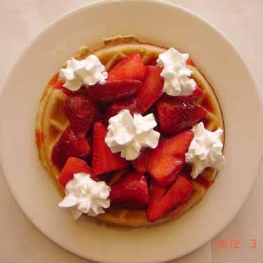 15 chocolate strawberry dream cakes.... 9.65 pancakes with chocolate chips and topped with fresh strawberries. a chocolate lover s delight! sweet potato pancakes.... 9.15 pancake sandwich.... 9.85 carved baked ham between two pancakes, topped with two eggs (any style).