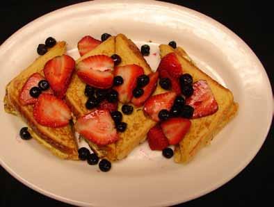 95 with fresh strawberries and blueberries Breakfast Sandwiches & Wraps scrambled eggs served on your choice of french bread, croissant or in a wrap with hash