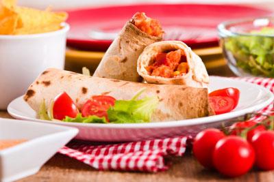 Chicken & Sweetcorn Burritos Serves: 4 225g Chicken Breast Strips* 125g Sweetcorn Kernels 100g tin Pinto Beans, rinsed 100g Ready-to-Eat Quinoa 2 tsp Hot Chilli Sauce 1 Lime, juice only 100g Light