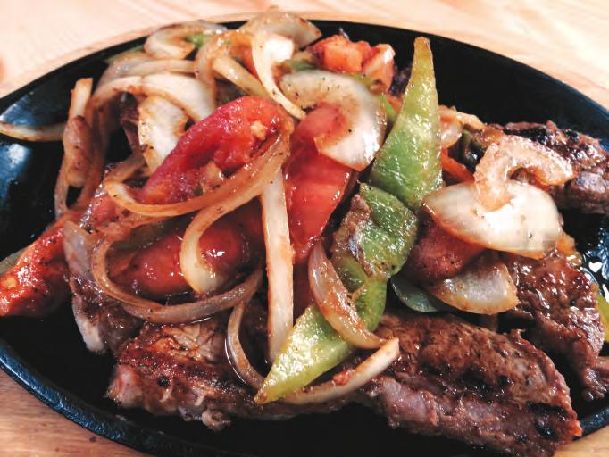 99 T-bone steak served on a skillet, and cooked with five grilled shrimp, sautéed onions, bell peppers, and tomatoes. Served with refried beans and Mexican rice on the side. Tortillas (3).