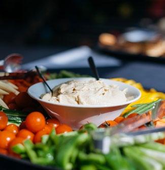 Finger Buffet Choose 6 items from the following Classic range of sandwiches Crudités with dips V Seasoned wedges with dips V Chunky chips/potato wedges with dips V Mature cheddar and red onion quiche
