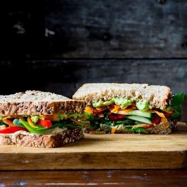 Veggie & Hummus Sandwich Makes 1 Total Time: 15 minutes 2 slices whole-grain bread 3 tablespoons hummus ¼ avocado, mashed ½ cup mixed salad greens ¼ medium red bell pepper, sliced ¼ cup sliced